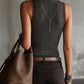 Ribbed Knit Sleeveless Vest With Pearl Button Detailing