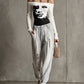 Black And White Off-Shoulder Knit Sweater With Abstract Face Design